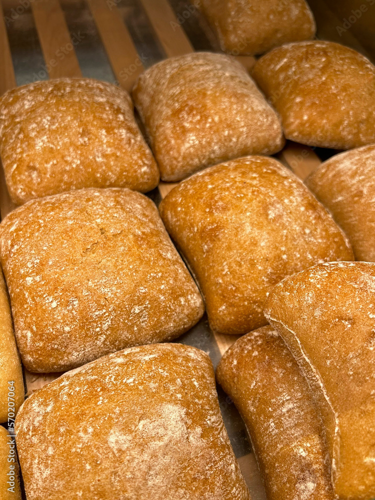 Fototapeta premium Ciabatta bread. Small bread buns in a bakery