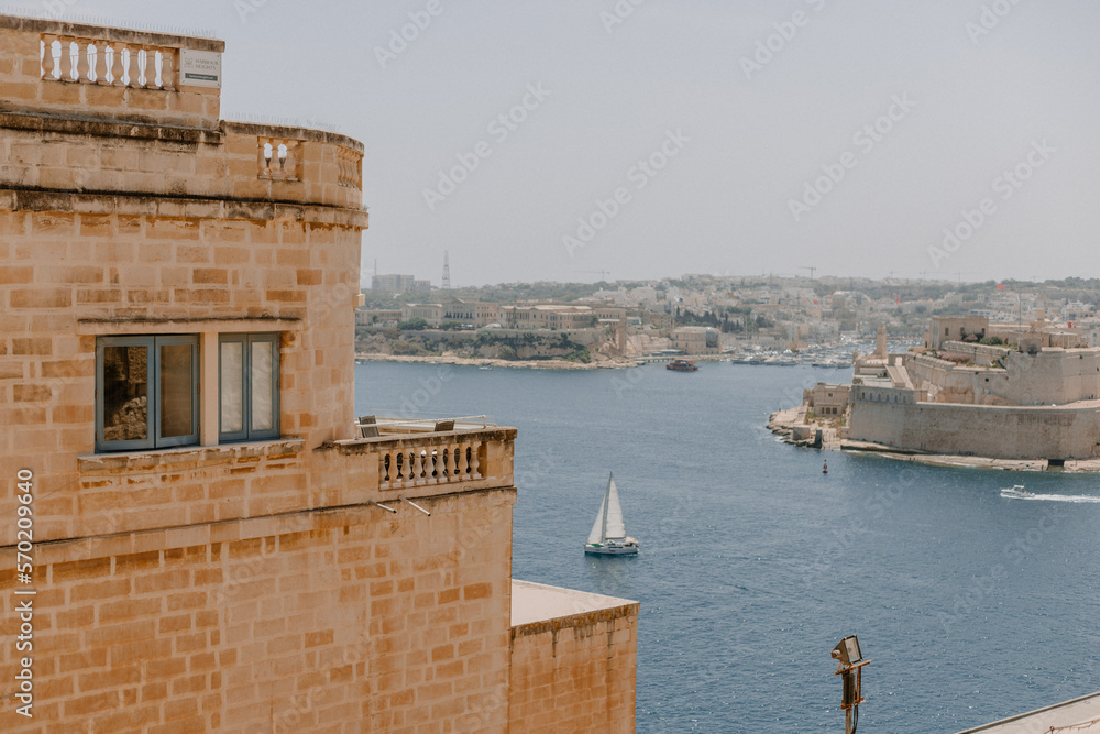 View of the sea and a sail boat from a lookout in Valletta