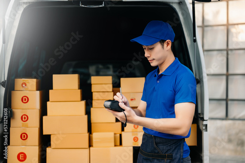Portrait of courier delivery man searching the address on digital tablet. Delivery service, delivery home