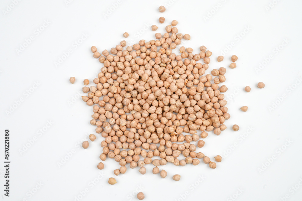 A pile of scattered dry chickpeas on white background top view A pile of scattered dry chickpeas on white background top view