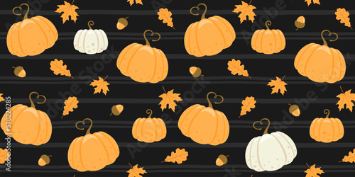 Orange and white pumpkins, acorns, maple and oak leaves on a black striped background. Endless texture with seasonal vegetable. Vector seamless pattern for country fair, farm market or autumn festival