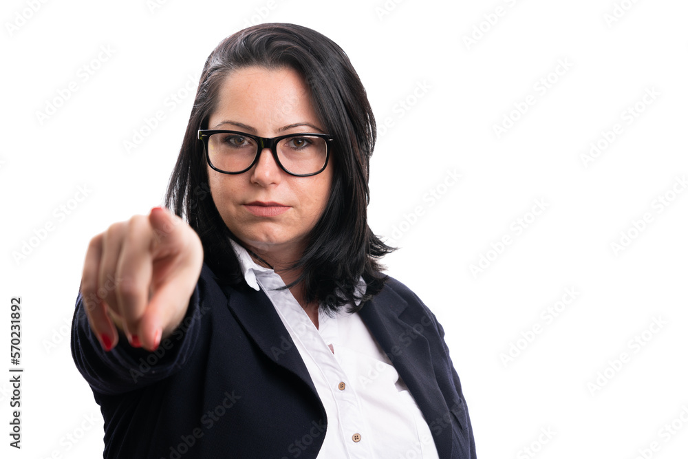 Serious businesswoman pointing index finger at camera Serious businesswoman pointing index finger at camera