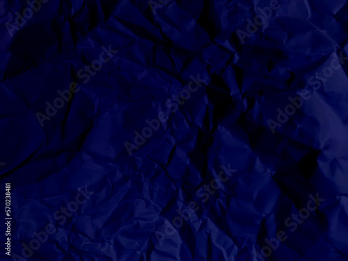 Realistic and crumpled blue paper texture or blue canvas or a blue paper surface, blue crumpled fabric stain texture with various griany stains.