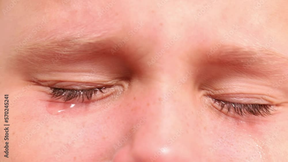 Animated video shot of close up frightened, abandoned, lonely little girl eyes, crying and blinking with pain on white background. Lonely children, adoption and foster families. Kid abuse and safety Animated video shot of close up frightened, abandoned, lonely little girl eyes, crying and blinking with pain on white background. Lonely children, adoption and foster families. Kid abuse and safety