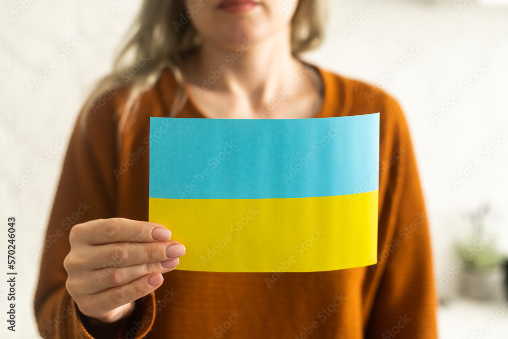 Ukrainian flag in hands, freedom Ukrainian flag in hands, freedom