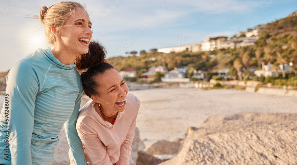 Fototapeta premium Woman, friends and fitness laughing at the beach for funny joke, meme or time together in the outdoors. Happy women enjoying exercise with laugh in humor for fun sports workout by the ocean coast