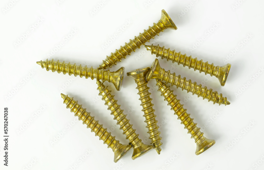 Self-tapping screws and screws on a white background Self-tapping screws and screws on a white background
