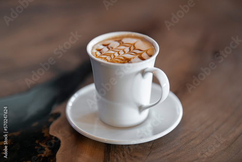 Fototapeta Naklejka Na Ścianę i Meble -  delicious latte coffee on wooden table