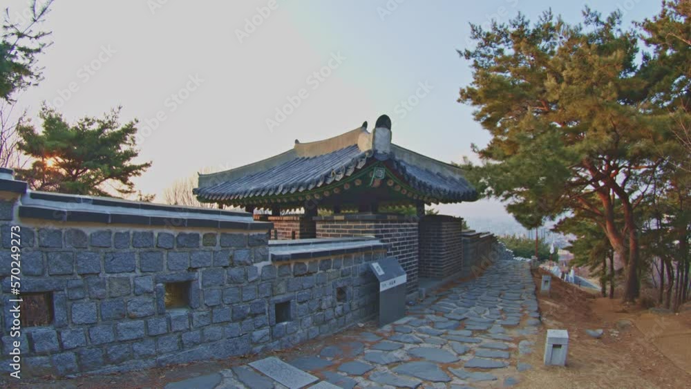 Asian Korean Hwaseong fortress rock stone wall and ladder in Suwon, traditional culture architecture object UNESCO heritage wide angle view Asian Korean Hwaseong fortress rock stone wall and ladder in Suwon, traditional culture architecture object UNESCO heritage wide angle view