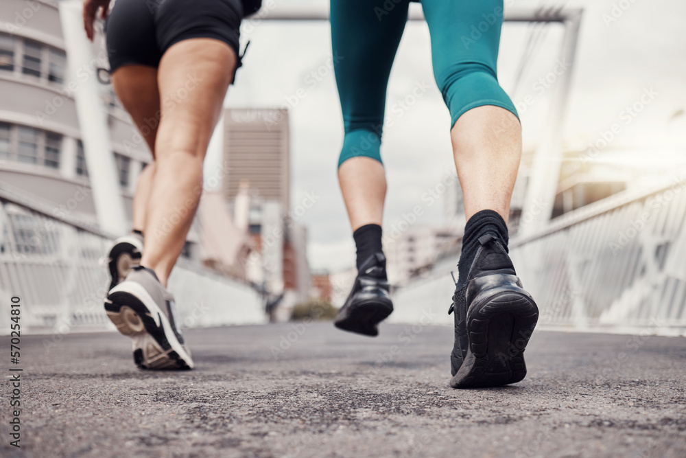 Fitness, city or legs running in training, workout or cardio exercise on New York bridge for a marathon. Zoom, runners or friends athletes with sports motivation, mindset or resilience for goals Fitness, city or legs running in training, workout or cardio exercise on New York bridge for a marathon. Zoom, runners or friends athletes with sports motivation, mindset or resilience for goals
