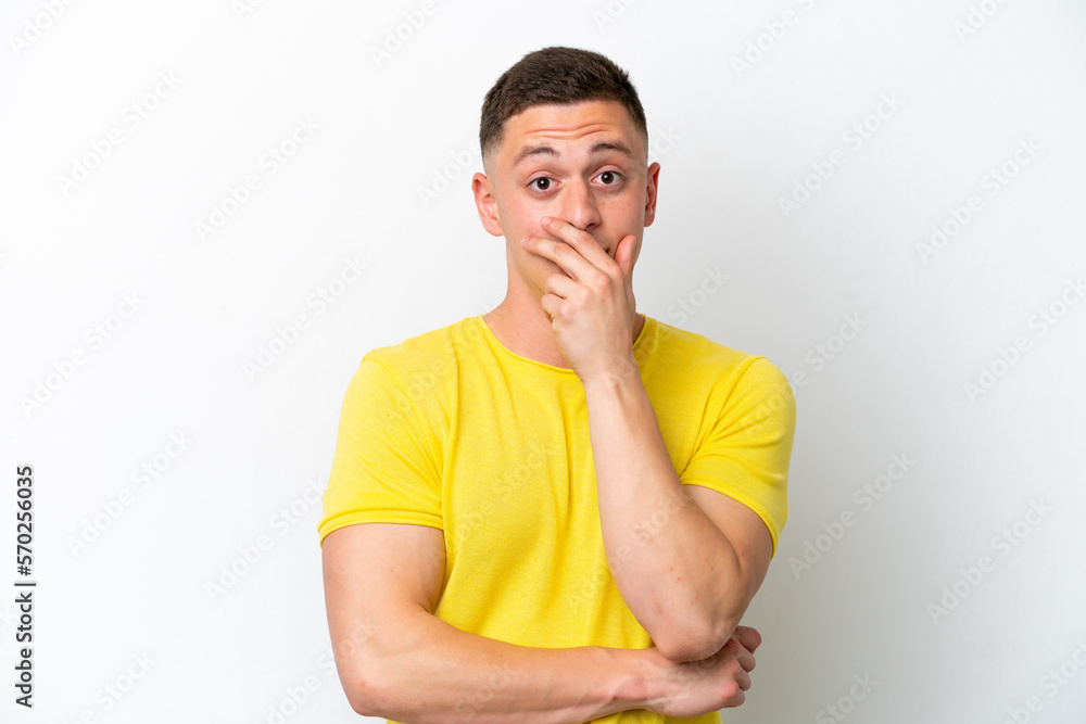 Young brazilian man isolated on white background surprised and shocked while looking right Young brazilian man isolated on white background surprised and shocked while looking right