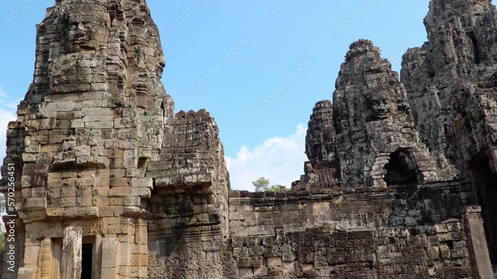 Ancient ruins Thom Bayon temple - famous Cambodian landmark, Angkor Wat complex of temples. Siem Reap, Cambodia. Ancient ruins Thom Bayon temple - famous Cambodian landmark, Angkor Wat complex of temples. Siem Reap, Cambodia.