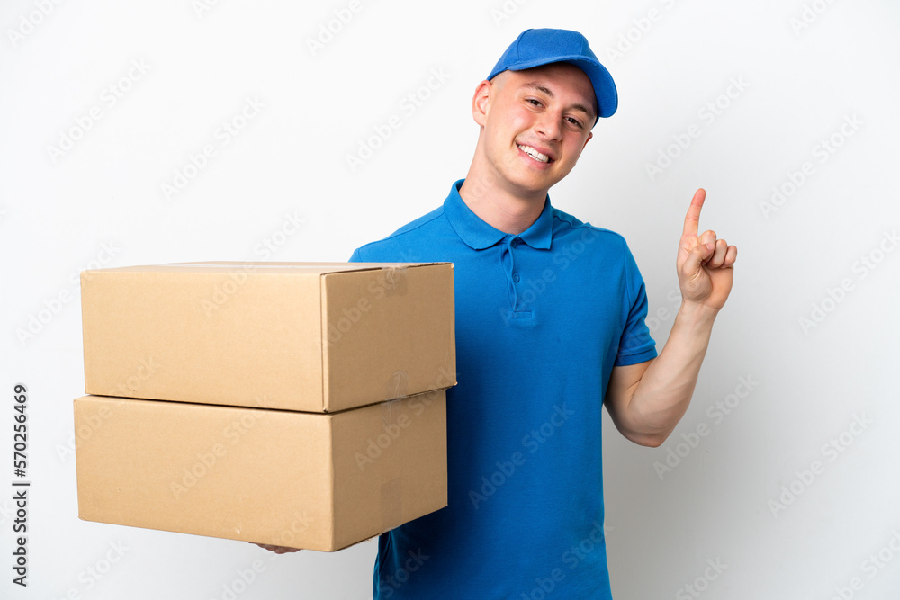 Young delivery Brazilian man isolated ops white background showing and lifting a finger in sign of the best Young delivery Brazilian man isolated ops white background showing and lifting a finger in sign of the best