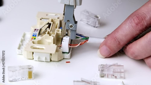 installing a network cable into a prefabricated RJ45 module using the LSA punch down tool, ethernet socket photo