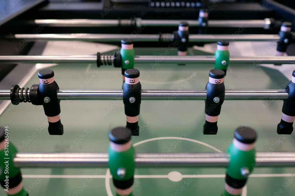 Fototapeta premium Selective focus on foosball table player