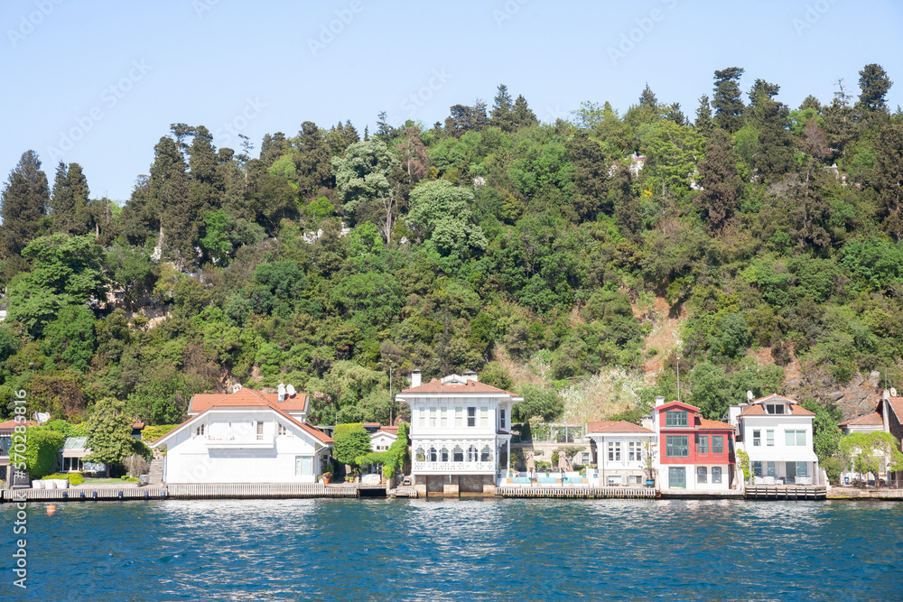 Luxury houses on the Bosphorus strait in Istanbul, Turkey, some in wood, in a residential district of the city, by the marmara sea, in a high real estate development area.