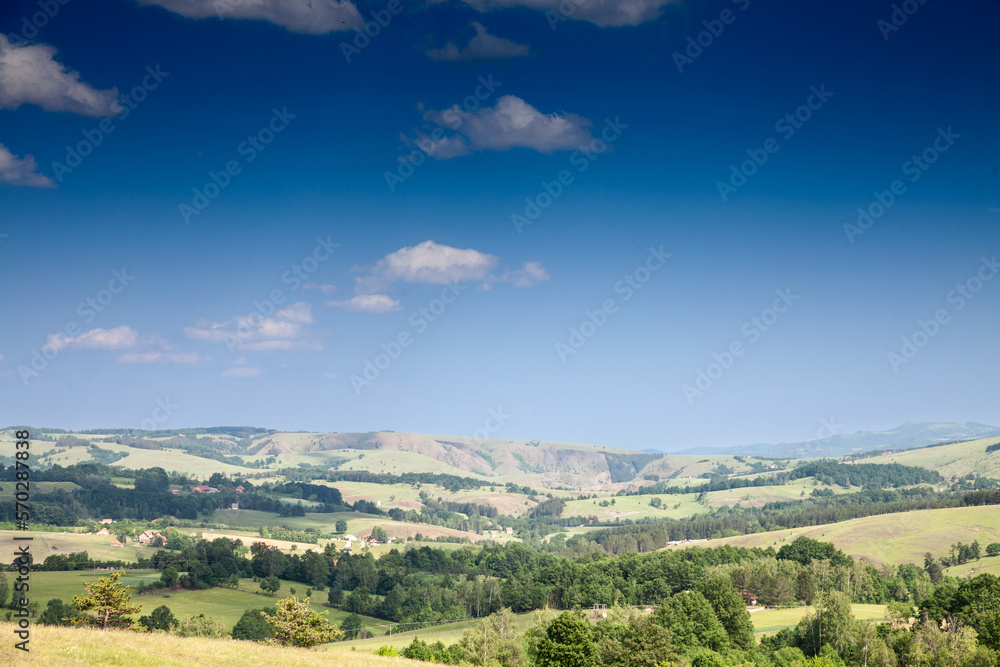 panorama seen from above of the Tometino Polje mountains and plain with agricultural landscape, a major mountain panorama of Serbia..