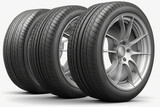 Car tires with a great profile in the car repair shop. Set of summer or winter tyres in front of white fond. On white PNG background