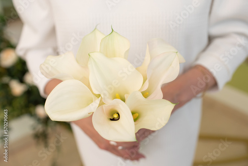 Bride's bouquet in the hands of the bride