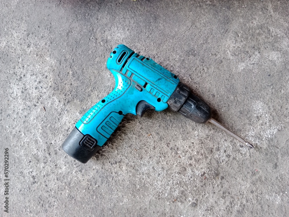 Cordless drill with drill bit working also as screw gun. Cordless drill with drill bit working also as screw gun.