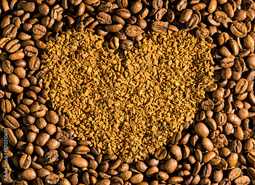 Natural ground coffee versus instant one in Yin Yang shaped plate, isolated on white natural versus instant coffee