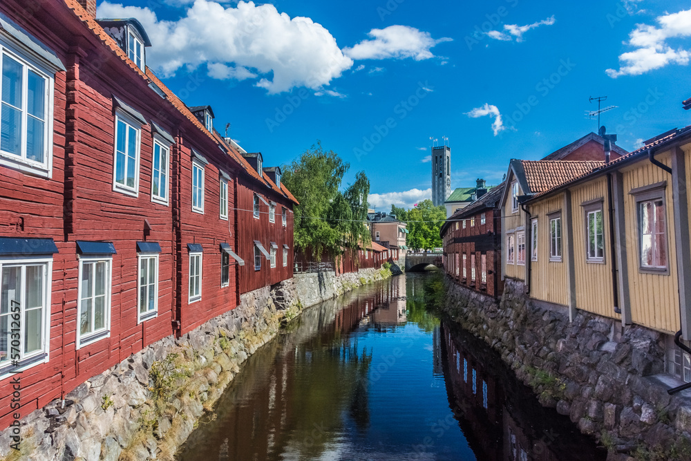 Colorful houses by the canal in the city center of Vasteras, Sweden