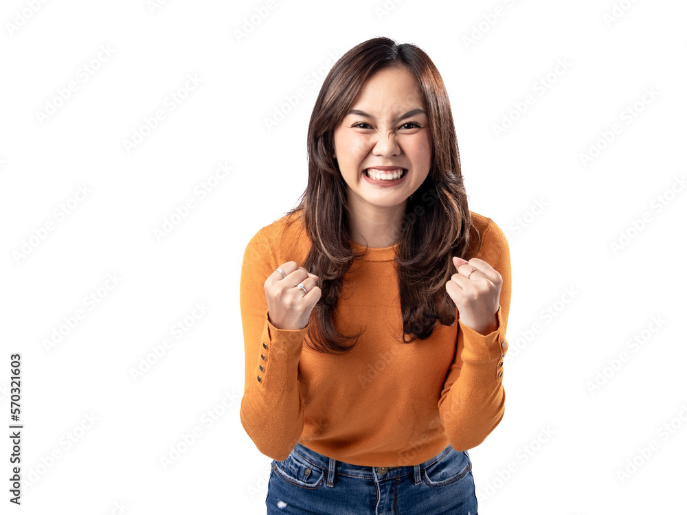 A portrait of a happy Asian Indonesian woman wearing an orange sweater, seen frustrated and angry, isolated on a white background A portrait of a happy Asian Indonesian woman wearing an orange sweater, seen frustrated and angry, isolated on a white background