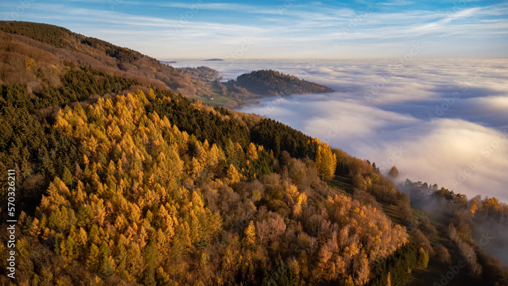 Beautiful sunset with an inversion that looks like a flowing sea ...