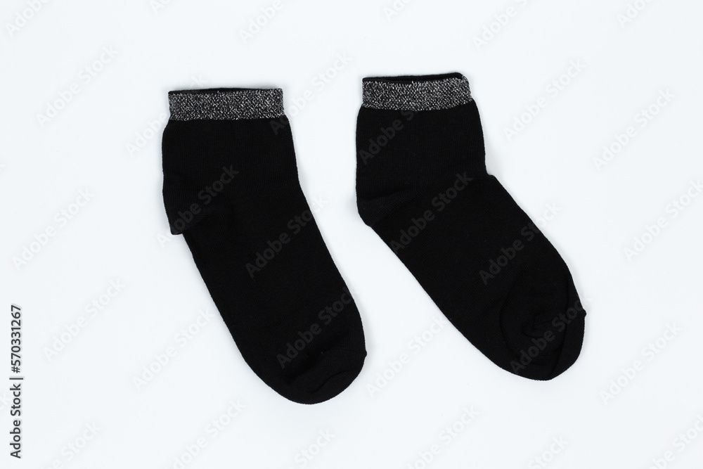 Socks on a white background. Socks on the leg. Socks on a white background. Socks on the leg.