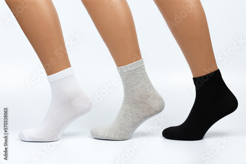 Socks on a white background. Socks on the leg.