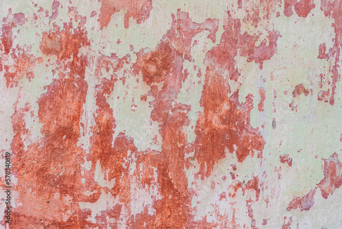 Rough textured wall surface with shabby paint. Backdrop for design, graphic resource © Iurii Gagarin