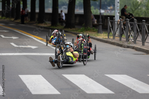 Group of Athletes with Their Special  Bikes on a City Track in a Race