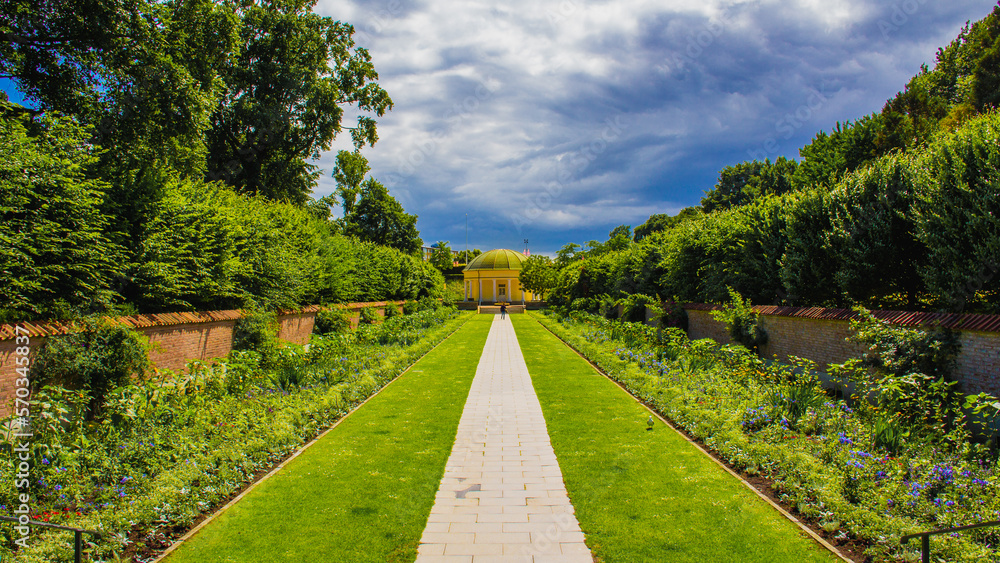 Dramatic sky over symmetry garden in park Pildammsmarken in Malmö Sweden during summer Dramatic sky over symmetry garden in park Pildammsmarken in Malmö Sweden during summer