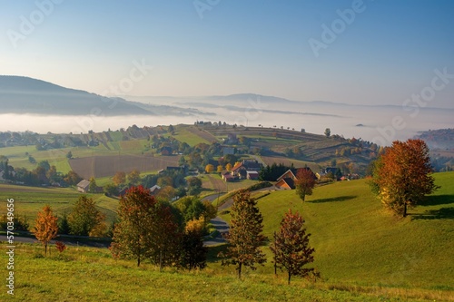 Colors of the autumn rural landscape of the hills in Slovakia, Podpolanie region, Hrinova. photo