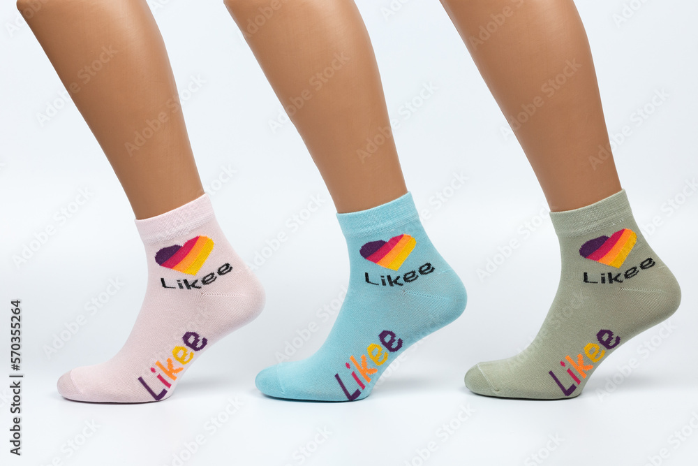 Socks on a white background. Socks on the leg. Socks on a white background. Socks on the leg.