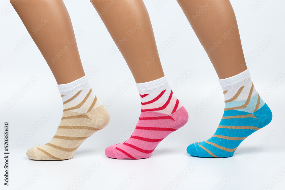 Socks on a white background. Socks on the leg. Socks on a white background. Socks on the leg.