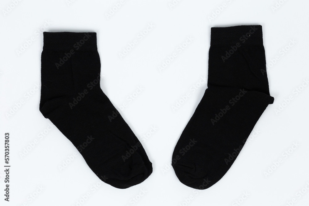 Socks on a white background. Socks on the leg. Socks on a white background. Socks on the leg.