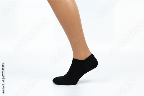 Socks on a white background. Socks on the leg.