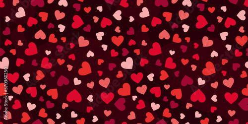 Vector seamless pattern with small red scattered hearts. Abstract geometric texture. Cute elegant background. Love and Valentine's day theme. Stylish repeatable design for gift wrapping, print, decor