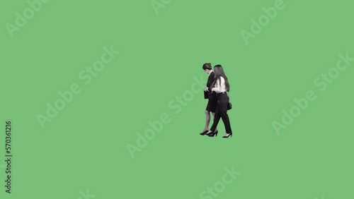 Two women in business clothes go and discuss business. Transparent background