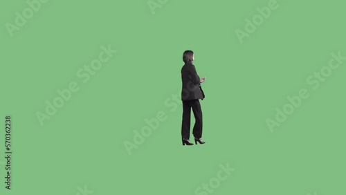 A young woman in a business suit walks through the frame in a perspective view
