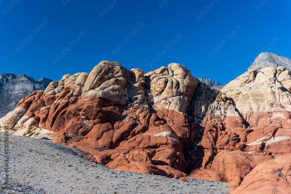 Hiking through Red Rock in Nevada with blue sky