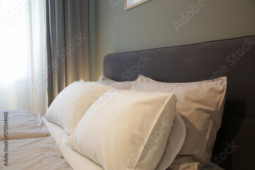 Fototapeta Naklejka Na Ścianę i Meble -  King size bed in simple and cozy bedroom.	