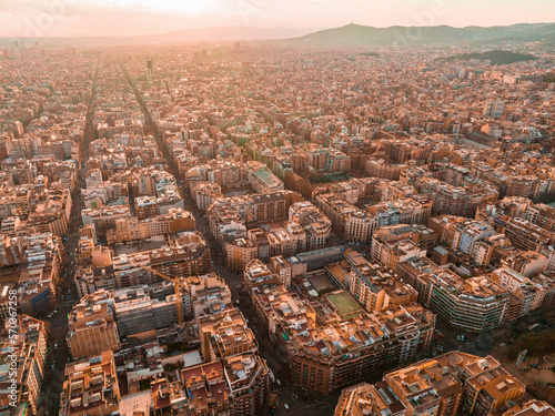 Barcelona street aerial view with beautiful patterns in Spain. Barcelona sunset skyline aerial view with buildings in Spain. Magical sunset over Barcelona.