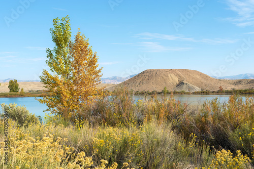 Recreational trail around Mack Mesa Lake in Highline Lake State Park, western Colorado on a sunny day in early autumn