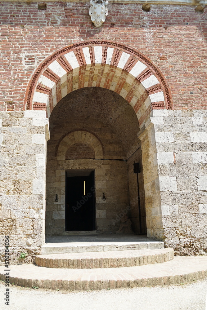 Entrance door of the chapel of San Galgano in Montesiepi, Tuscany, Italy