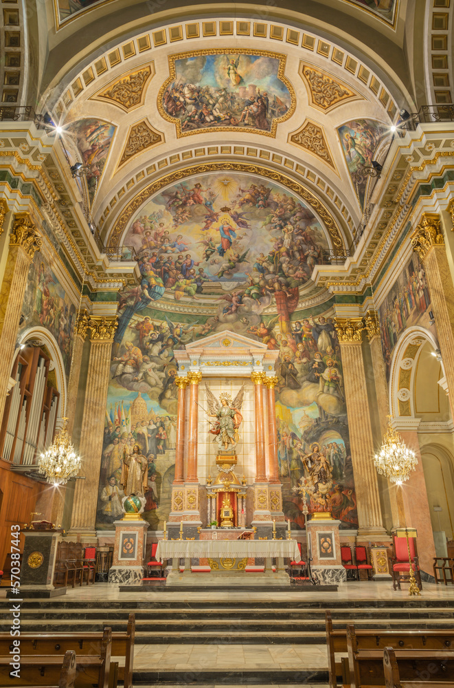 VALENCIA, SPAIN - FEBRUAR 17, 2022: The presbytery of church Iglesia del Santo Angel Custodio with the frescoes by Raffael Cardells from 20. cent.