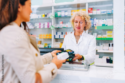 Obraz na plátně Cellphone application payment in pharmacy.