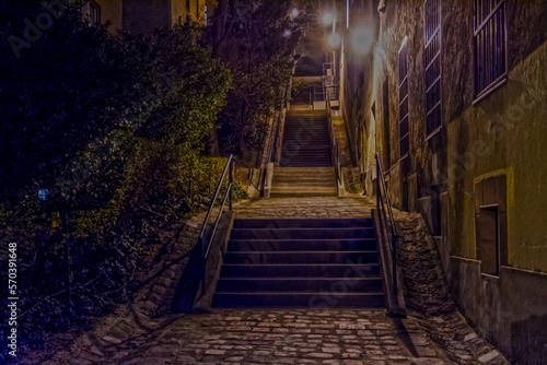 Fototapeta Naklejka Na Ścianę i Meble -  Street photo in Budapest at night with stairs