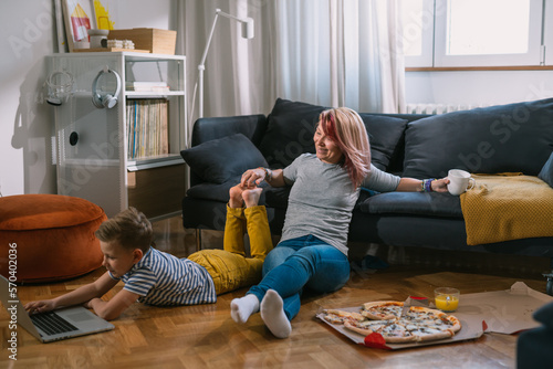 Obraz na płótnie Mother and son spend weekend together at home
